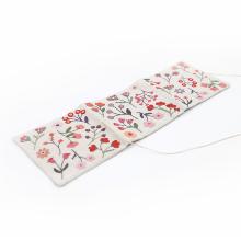 Porte-aiguille fleuri - Corail